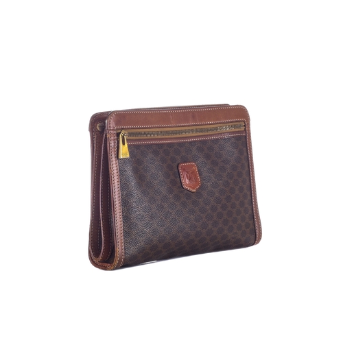 311 - Celine, a vintage macadam wristlet clutch, featuring the maker's brown monogram coated canvas exteri... 