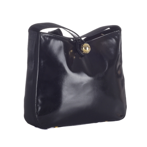 313 - Celine, a vintage black leather handbag, designed with a glossy black leather exterior and black nyl... 