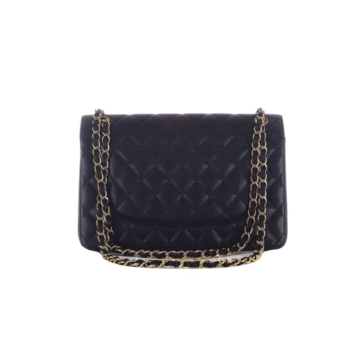 322 - Chanel, a Jumbo Classic Double Flap handbag, featuring a black quilted caviar leather exterior, with... 