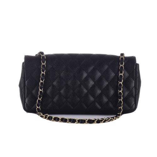 323 - Chanel, a black caviar East West single flap handbag, featuring the maker's iconic black quilted cav... 