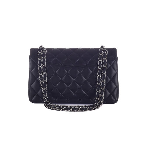 325 - Chanel, a Small Classic Double Flap handbag, designed with a diamond quilted black lambskin leather ... 