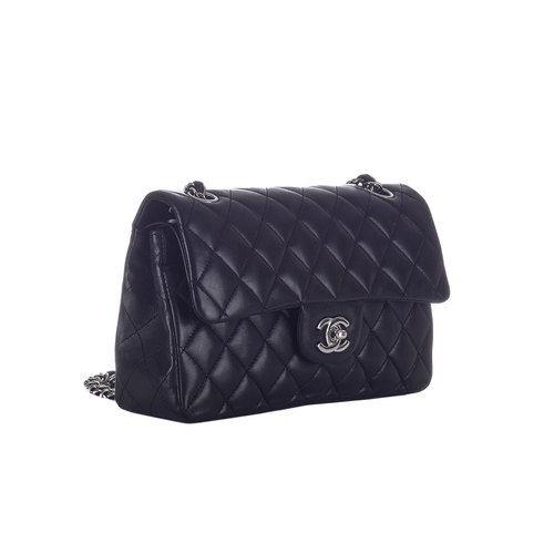 325 - Chanel, a Small Classic Double Flap handbag, designed with a diamond quilted black lambskin leather ... 