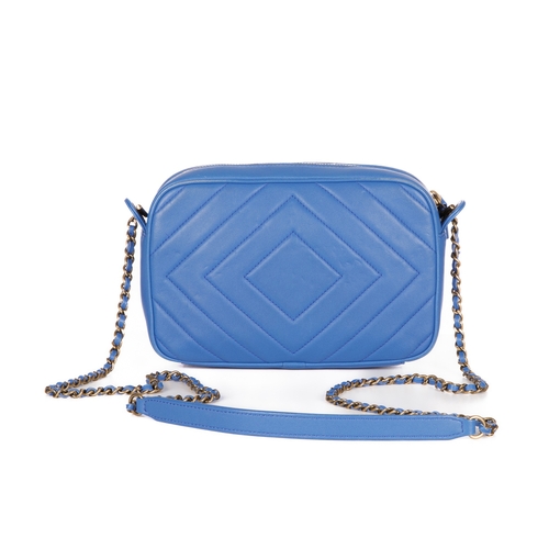 327 - Chanel, a Pyramid camera bag, featuring a blue diamond-quilted leather exterior, with aged gold-tone... 