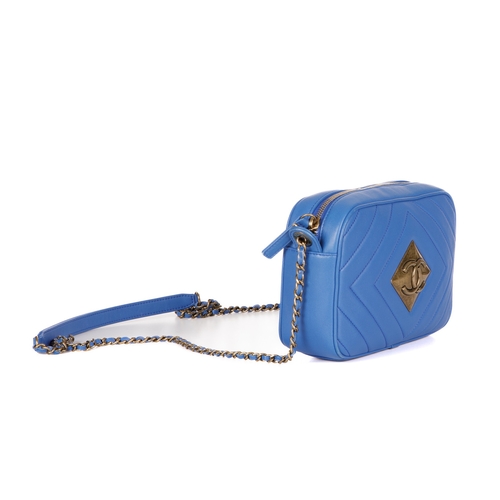 327 - Chanel, a Pyramid camera bag, featuring a blue diamond-quilted leather exterior, with aged gold-tone... 