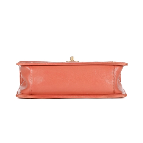 328 - Chanel, a Reversed Chevron Envelope Flap handbag, crafted from peach lambskin leather, with brushed ... 