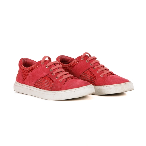 333 - Chanel, a pair of red CC sneakers, featuring suede and mesh uppers and white rubber soles, labelled ... 