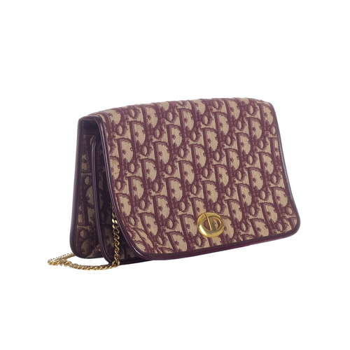 341 - Christian Dior, a vintage Trotter handbag, designed with a burgundy and cream monogram canvas exteri... 