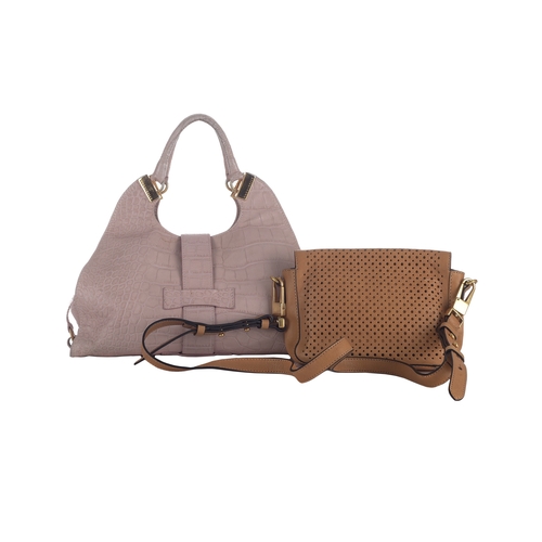 357 - Coccinelle, two handbags, to include a pale pink crocodile embossed leather handbag with rolled leat... 