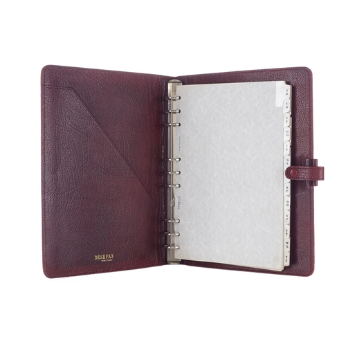 358 - Deskfax Filofax, a vintage Bordeaux leather planner w/ inserts, crafted from grained burgundy calf l... 