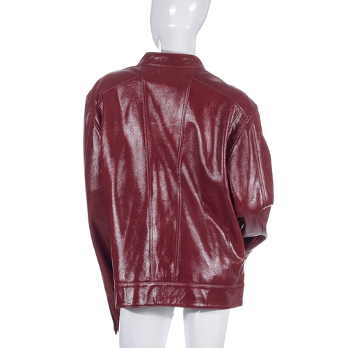 359 - DKNY Jeans, a men's red leather jacket, featuring a front zip fastening, four outer pockets and one ... 