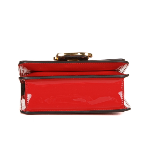 365 - Fendi, a Karligraphy patent leather handbag, designed with a cardinal red patent leather exterior, w... 