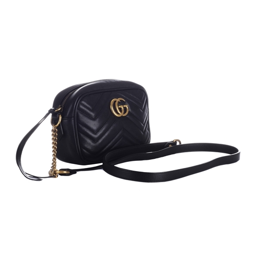 370 - Gucci, a mini matelasse Marmont camera handbag, crafted from chevron-quilted black leather, with gol... 