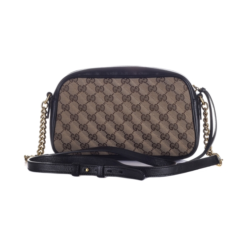 371 - Gucci, a GG matelasse Marmont camera bag, featuring the maker's GG monogram canvas exterior with qui... 