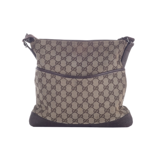 379 - Gucci, a medium messenger bag, designed with the maker's GG monogram canvas exterior with brown leat... 