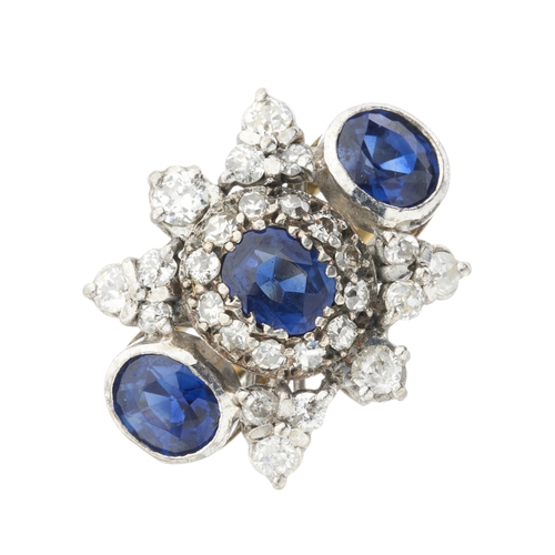 38 - A mid 20th century 18ct gold sapphire and old-cut diamond cluster dress ring, estimated total sapphi... 