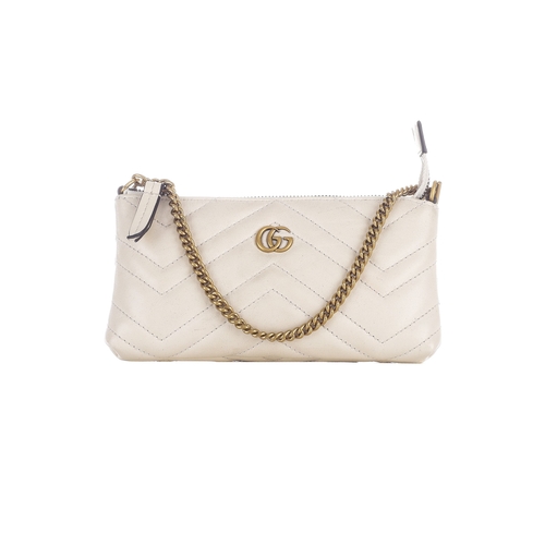 383 - Gucci, a mini Matelasse Marmont chain purse, crafted from chevron-quilted cream leather, with brushe... 