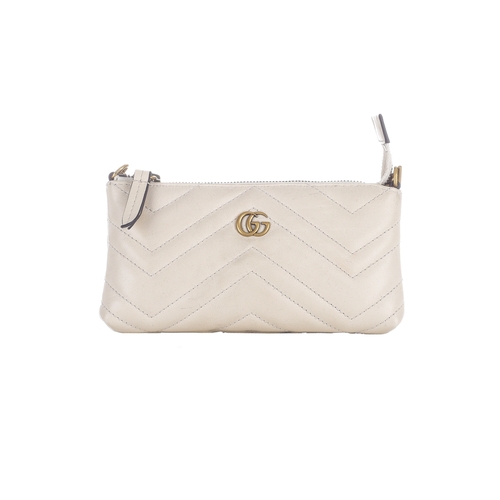 383 - Gucci, a mini Matelasse Marmont chain purse, crafted from chevron-quilted cream leather, with brushe... 