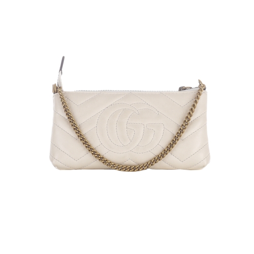 383 - Gucci, a mini Matelasse Marmont chain purse, crafted from chevron-quilted cream leather, with brushe... 