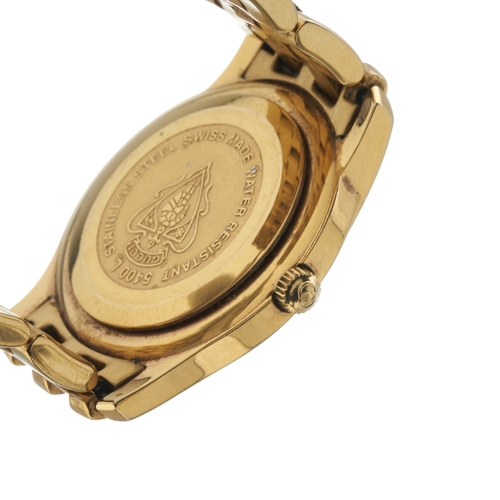 389 - Gucci, a gold plated 5400L bracelet watch, featuring a white dial with black Roman numerals and date... 