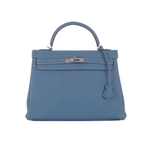 390 - Hermes, a 2003 Bleu Jean Kelly Retourne 32 handbag, crafted from light blue Fjord leather, with pall... 