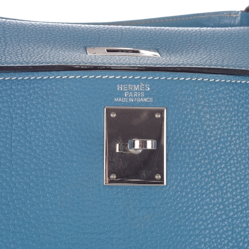 390 - Hermes, a 2003 Bleu Jean Kelly Retourne 32 handbag, crafted from light blue Fjord leather, with pall... 