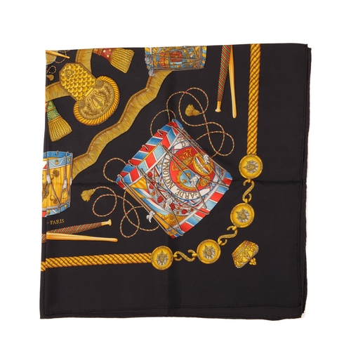 393 - Hermes, a Les Tambours silk scarf, designed by Joachim Metz, first issued in 1989, depicting drums u... 