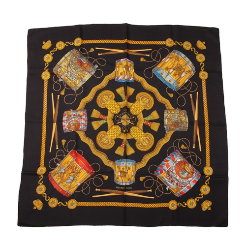 393 - Hermes, a Les Tambours silk scarf, designed by Joachim Metz, first issued in 1989, depicting drums u... 