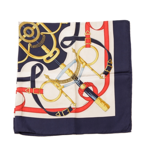 394 - Hermes, an Eperon d'Or silk scarf, designed by Henri d'Origny, originally issued in 1974, with an eq... 