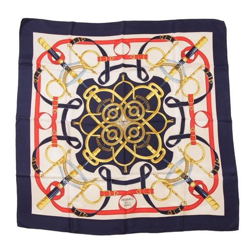 394 - Hermes, an Eperon d'Or silk scarf, designed by Henri d'Origny, originally issued in 1974, with an eq... 