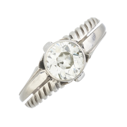 40 - A mid 20th century old-cut diamond single-stone ring, with grooved and polished asymmetric open band... 