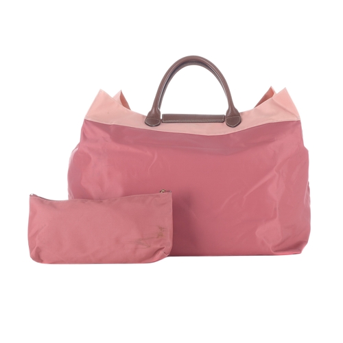 401 - Longchamp, a Pliage XL beach bag w/pouch, to include an x-large pink two-tone nylon bag, with loopin... 