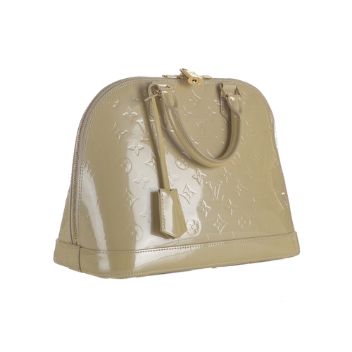 405 - Louis Vuitton, a monogram vernis Alma PM handbag, designed with a cream monogram embossed patent lea... 