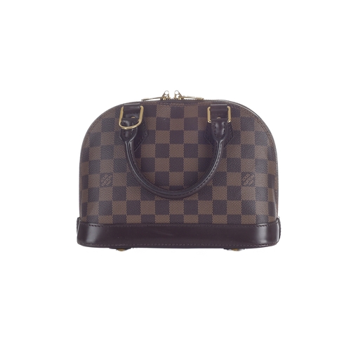 412 - Louis Vuitton, a damier Alma BB handbag, designed with a damier coated canvas exterior and smooth br... 