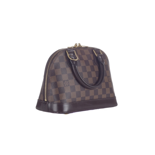 412 - Louis Vuitton, a damier Alma BB handbag, designed with a damier coated canvas exterior and smooth br... 