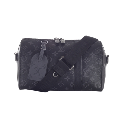 416 - Louis Vuitton, a monogram eclipse reverse Keepall Bandouliere 25 bag, crafted from the maker's monog... 