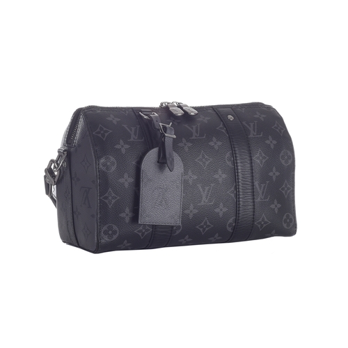 416 - Louis Vuitton, a monogram eclipse reverse Keepall Bandouliere 25 bag, crafted from the maker's monog... 