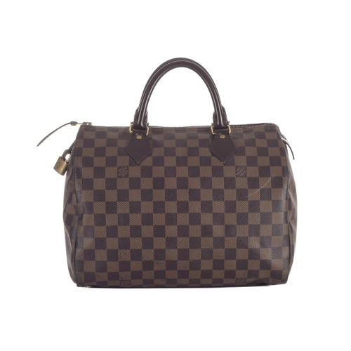 423 - Louis Vuitton, a damier Speedy 30 handbag, designed with a damier canvas exterior, smooth brown leat... 