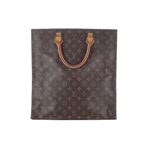 426 - Louis Vuitton, a monogram Sac Plat handbag, featuring vachetta rolled leather handles, an open top, ... 