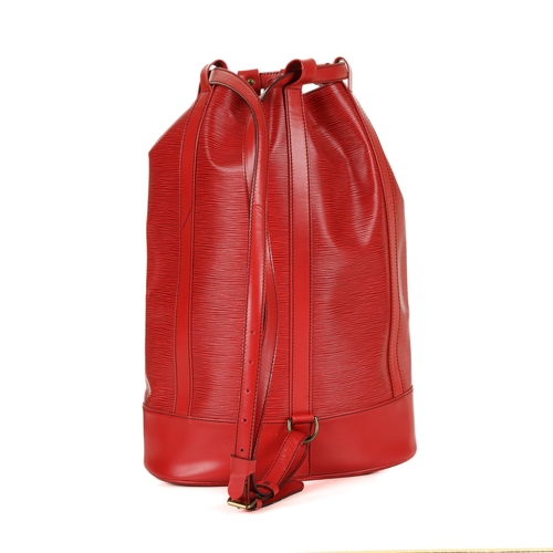 430 - Louis Vuitton, a red epi Randonnee GM handbag, featuring a textured red epi leather exterior and smo... 