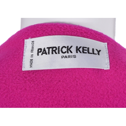 460 - Patrick Kelly, a 1980s fuchsia pink wool/cashmere coat, adorned with fancy gold-tone button details ... 