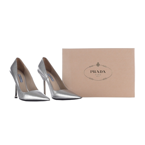 464 - Prada, a pair of silver stiletto heels, featuring silver saffiano leather uppers, with a pointed toe... 