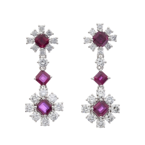 48 - A pair of 18ct gold ruby and brilliant-cut diamond drop earrings, total ruby weight 1.38ct, total di... 