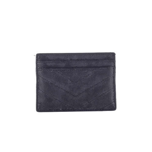 487 - Yves Saint Laurent, a black leather card holder, crafted from chevron-quilted grained black leather,... 