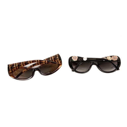 491 - Two pairs of designer sunglasses, to include a pair of Fendi FS299 sunglasses, featuring imitation t... 