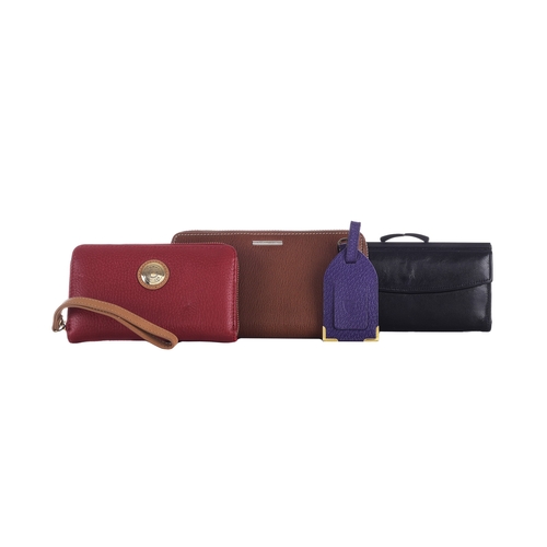 496 - A selection of small leather goods, to include a brown leather Ermengildo Zegna zip-around wallet, a... 