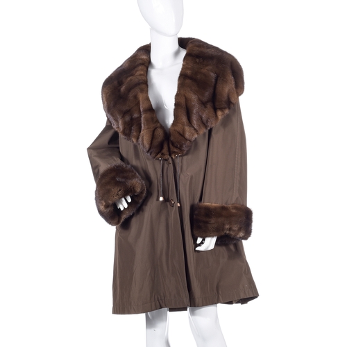 507 - Balmain, a ladies coat with fur trim, designed with a brown silk/polyester outer shell, featuring a ... 