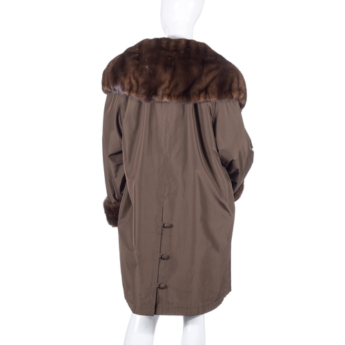 507 - Balmain, a ladies coat with fur trim, designed with a brown silk/polyester outer shell, featuring a ... 