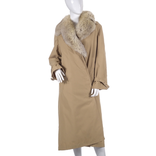 508 - A beige trench coat, featuring removable sheered coney fur lining and removable blue fox fur collar,... 