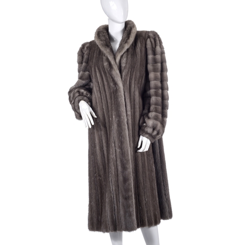 509 - Schrank, a blue iris mink coat, fully stranded, featuring a Mandarin collar, barrel sleeves with hor... 