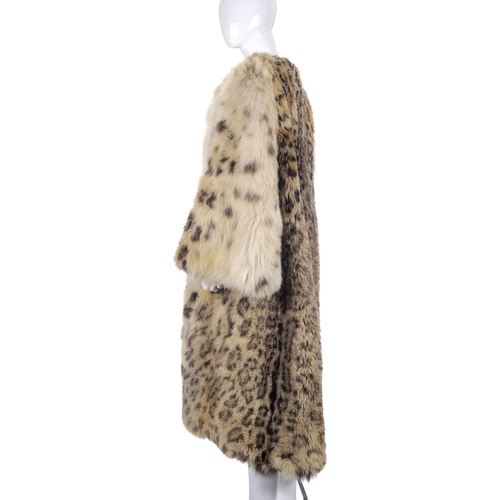 517 - A 1930s real snow leopard fur coat, calf length with wide bell sleeves and an open front, labelled d... 